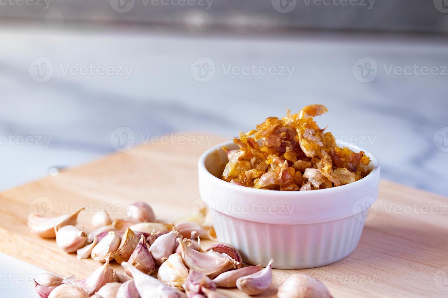 Crispy fried garlic in a white cup photo