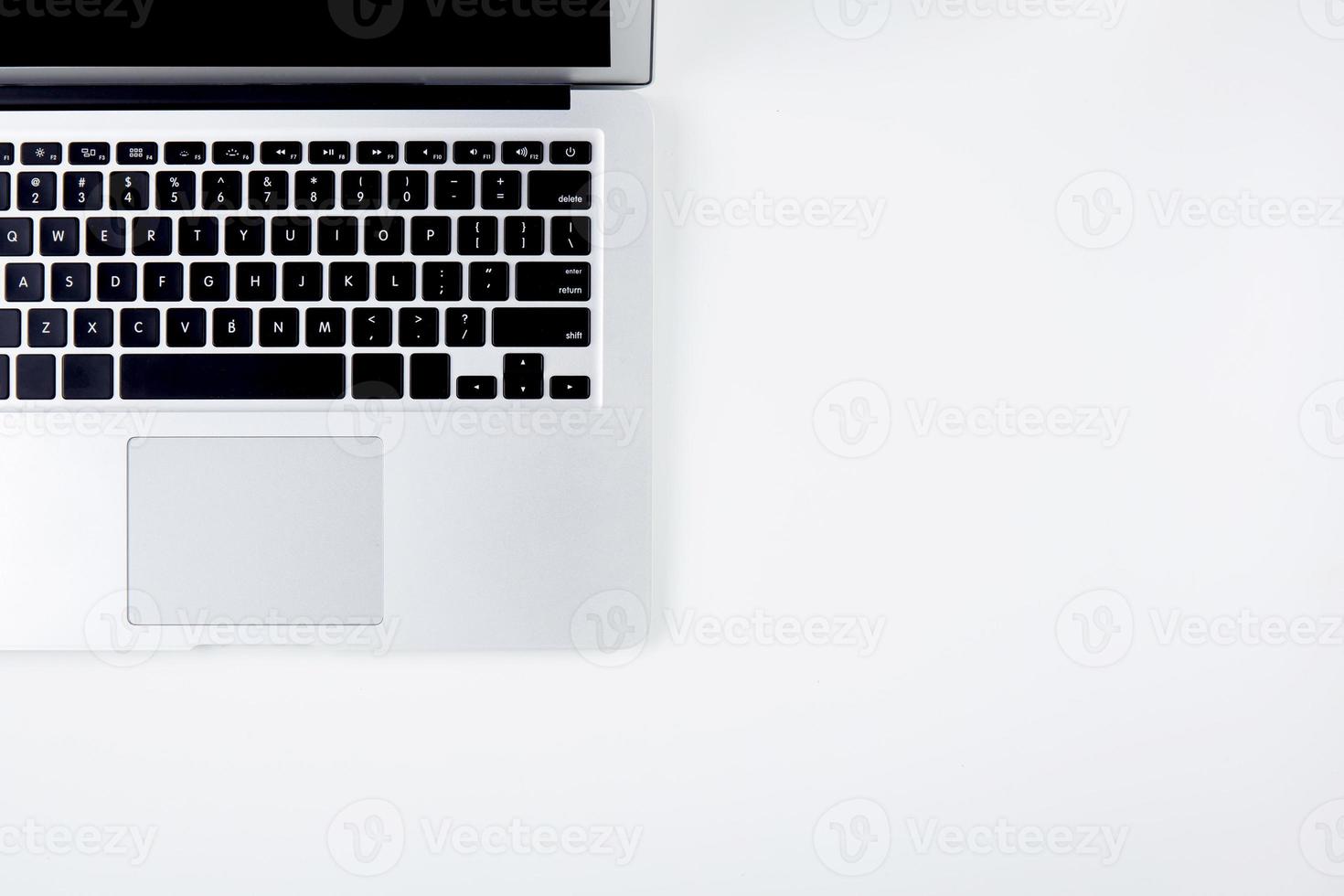 Top view of laptop computer with open display screen monitor isolated on white background, notebook or netbook with keyboard, communication technology concept. photo