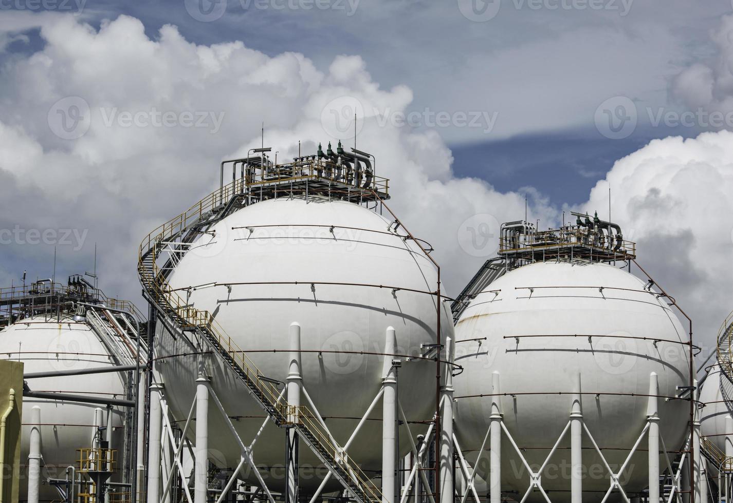 White spherical propane tanks containing fuel gas photo