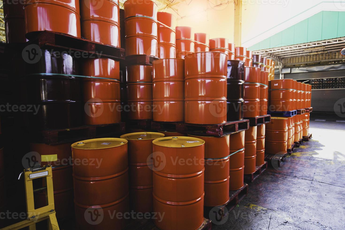 Red oil barrels chemical drums vertical stacked up photo