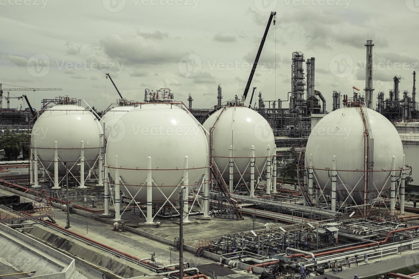 White spherical propane tanks containing fuel gas pipeline photo