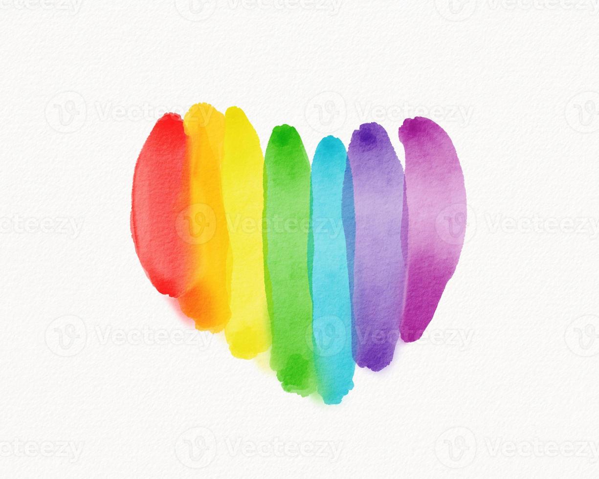 LGBT  Pride month watercolor texture concept. Rainbow flag brush style in heart shape isolate on white background. photo