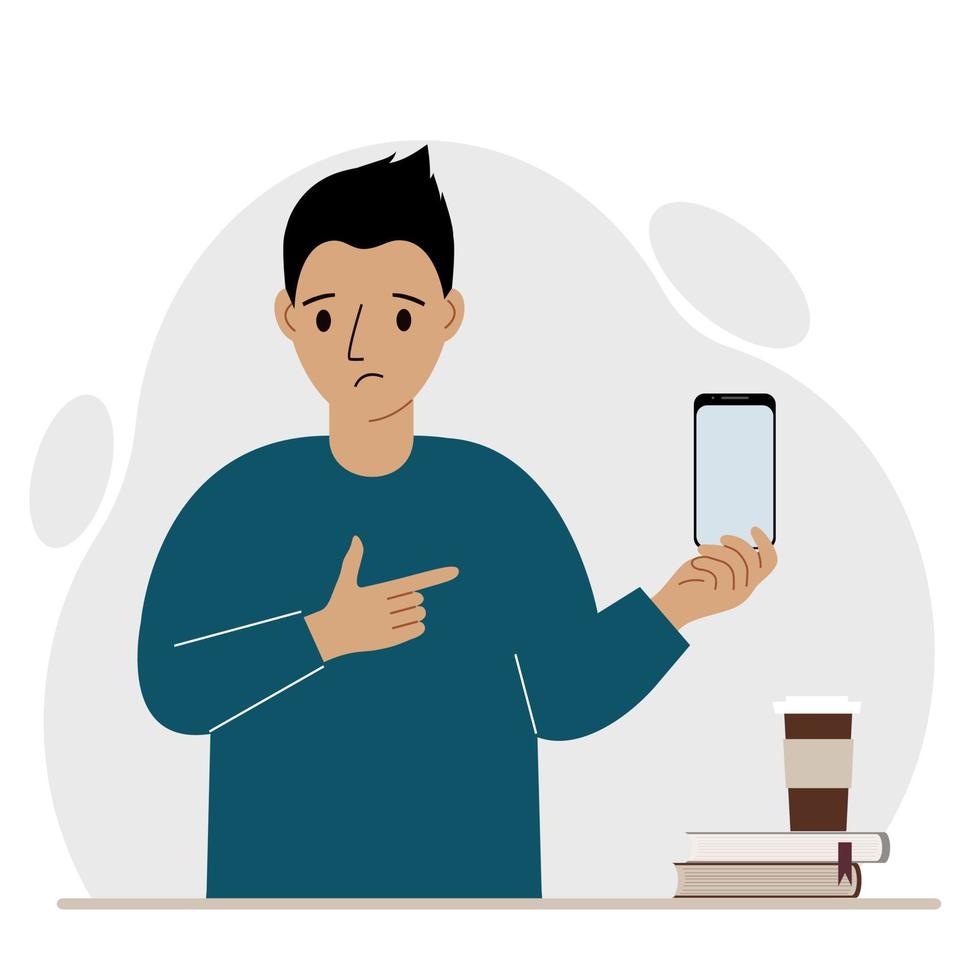 A sad man holds a mobile phone in one hand and points at it with the index finger of his other hand. Vector flat illustration