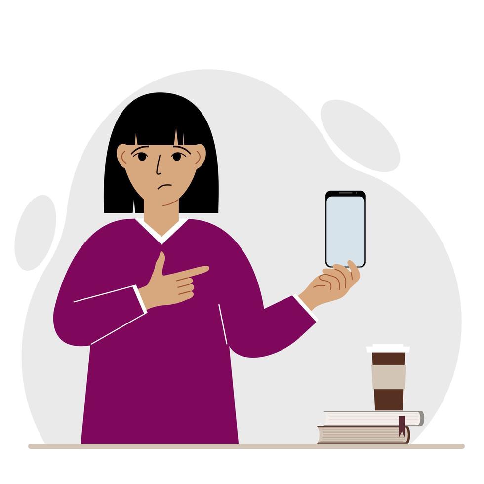 A sad woman holds a mobile phone in one hand and points at it with the index finger of his other hand. Vector flat illustration