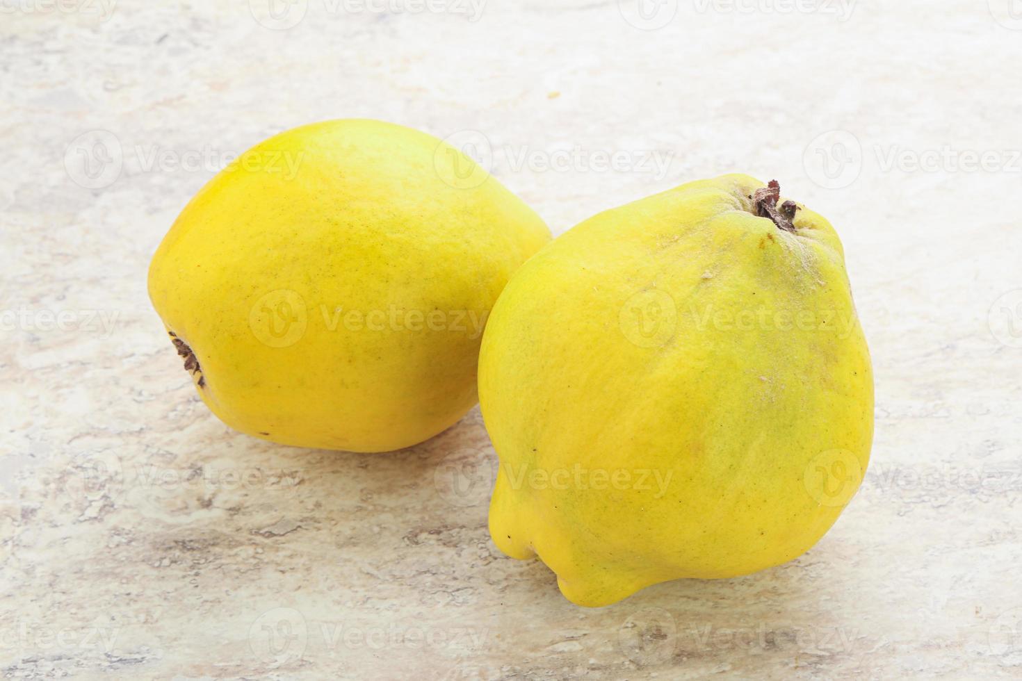 Fresh ripe yellow quince fruit photo