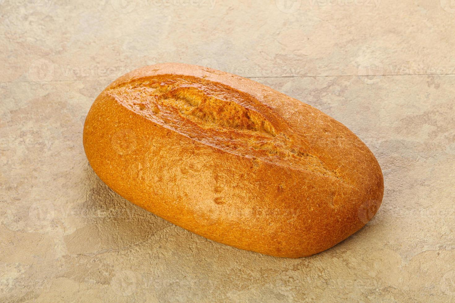 Homemade crust Bread loaf isolated photo