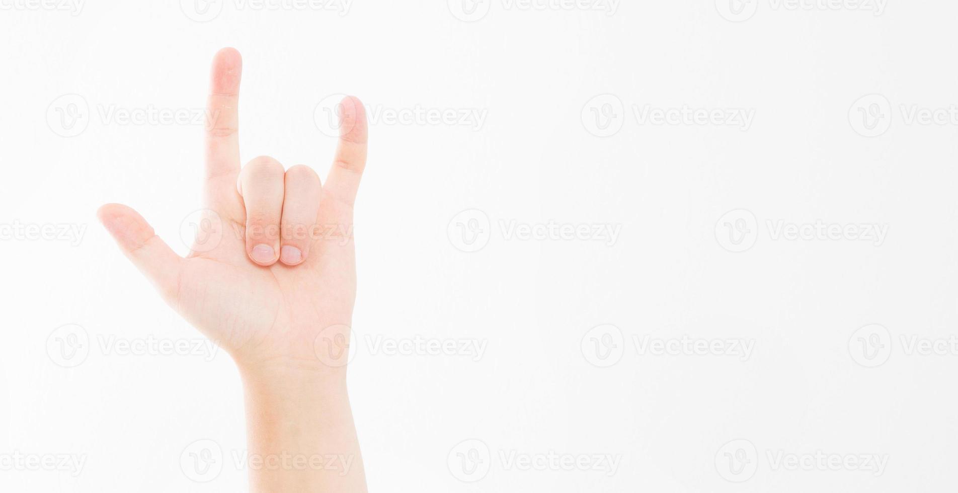 Man hand sign isolated on white background. Drive concept. Rock gesture, copy space. photo