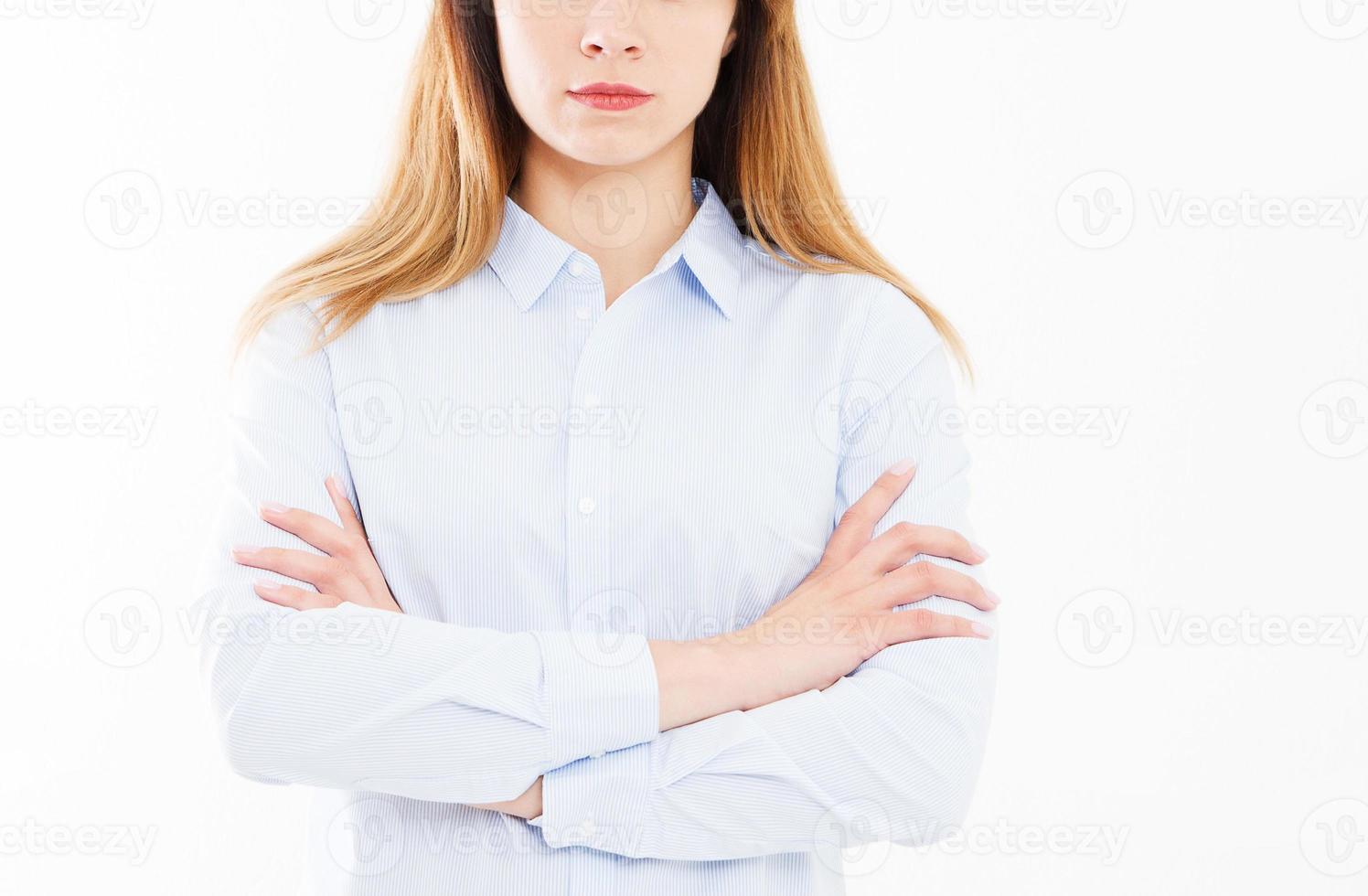 cropped portrait of business woman with crossed arms, girl in shirt. Confident young manager,team building concept, copy space photo