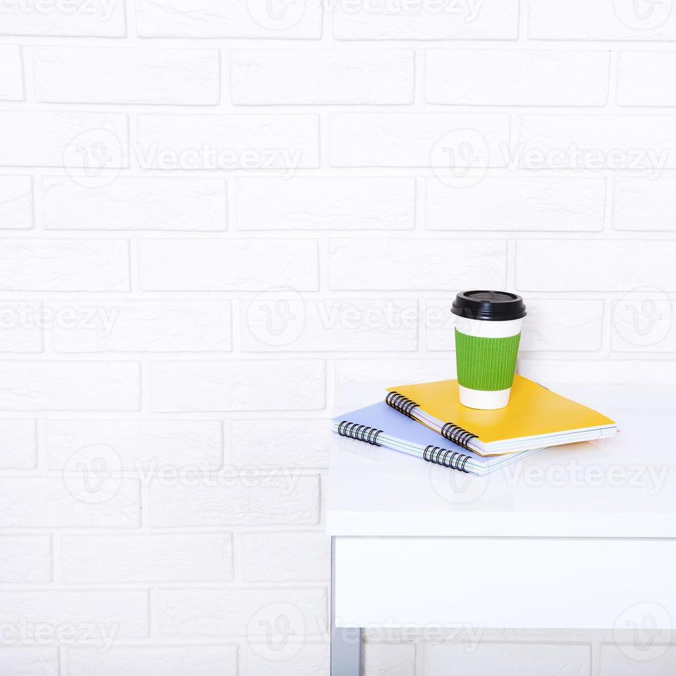 Stylish macro cup of coffee in office. Selective focus and copy space photo