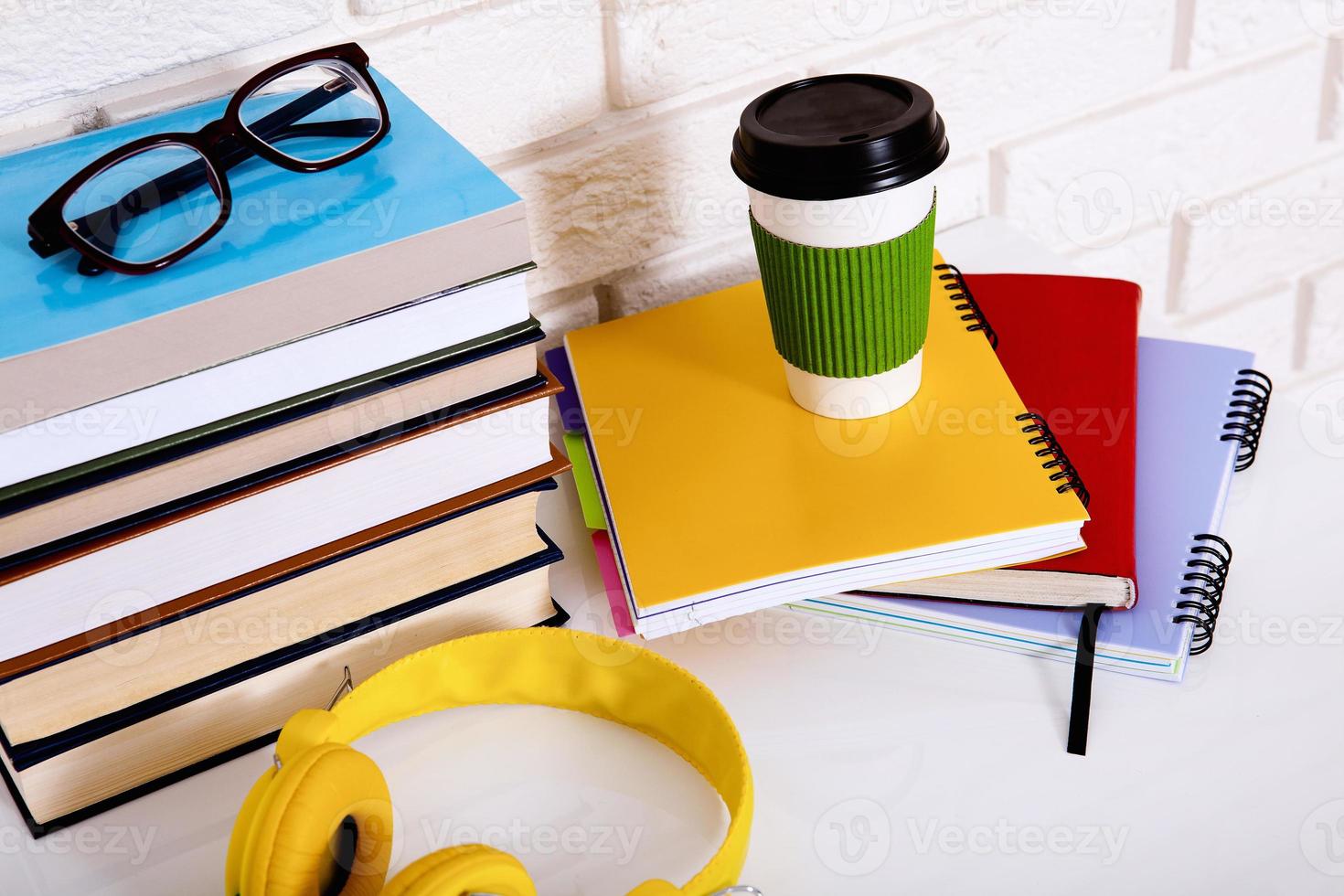 Workplace and education accessories on white table. Selective focus and copy space photo