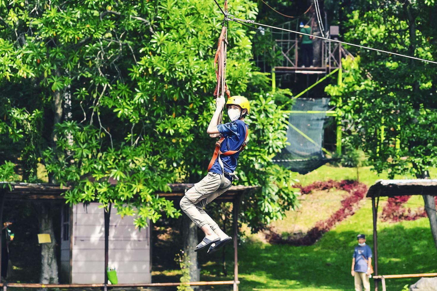 Bogor, West Java, Indonesia, May 2nd 2022. People playing flying fox at tourist sites photo