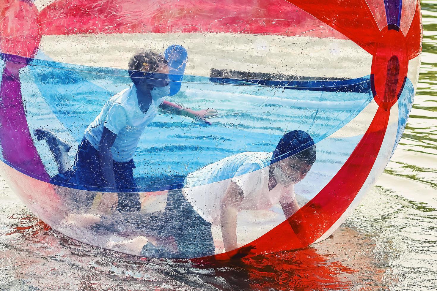 Bogor, West Java, Indonesia, May 2nd 2022. Big balloons that children use to play on the water. Air ball vehicle on water. photo