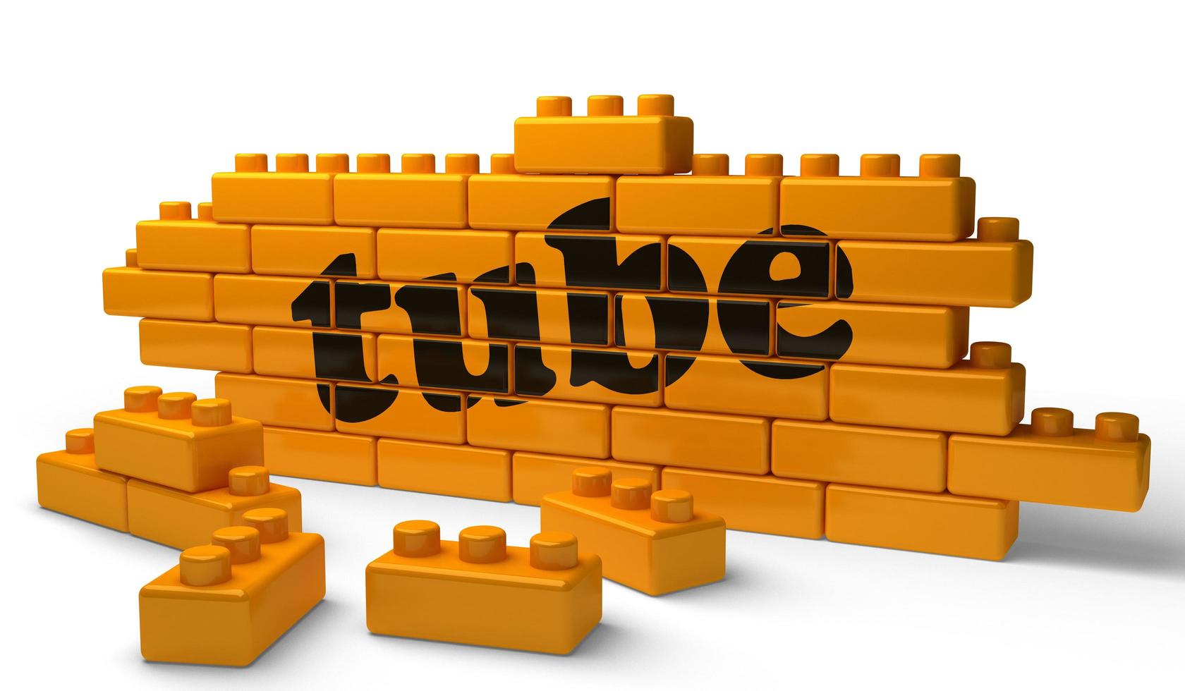 tube word on yellow brick wall photo