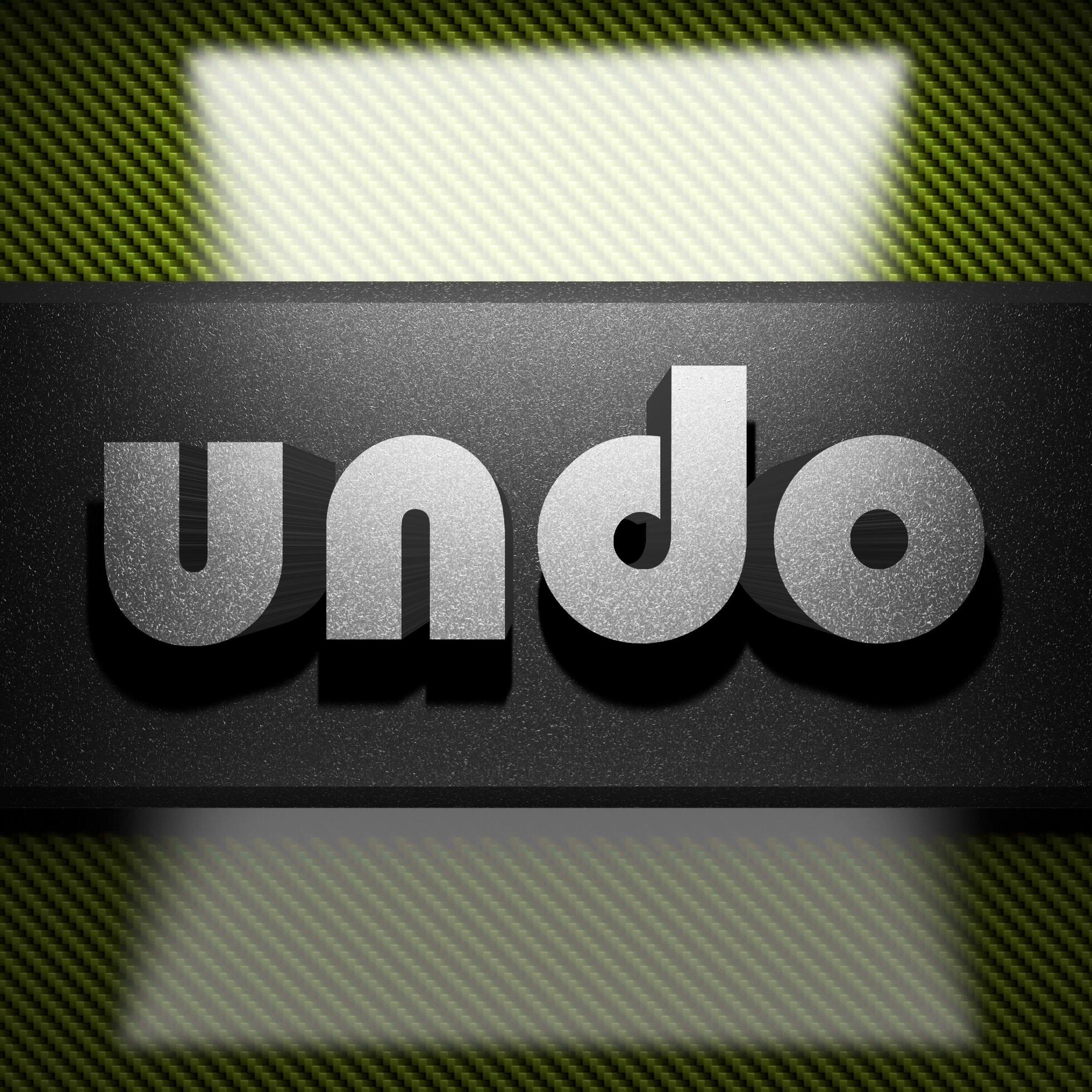 Undo word of iron on carbon 7512606 stock photo at vecteezy