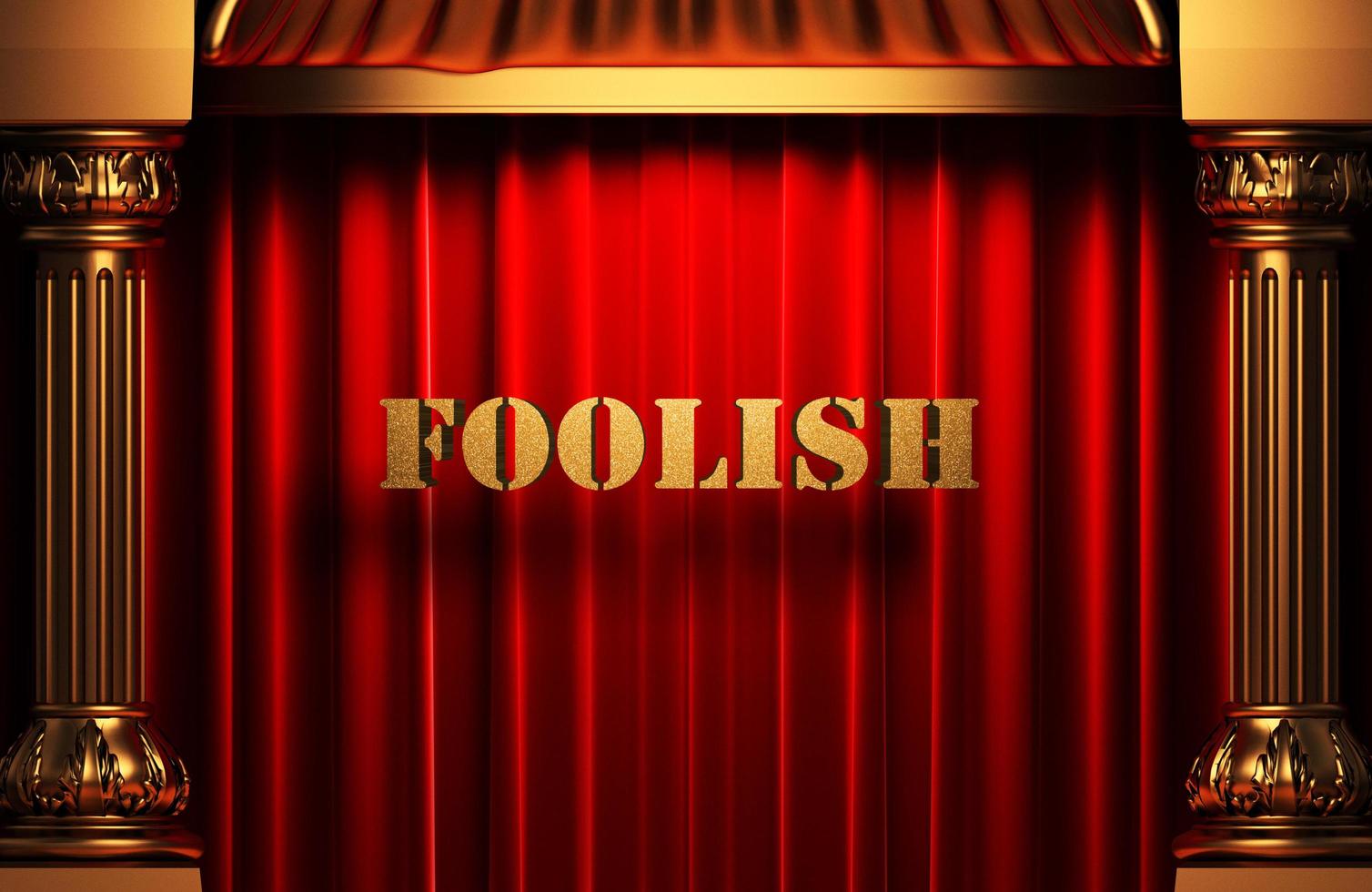 foolish golden word on red curtain photo