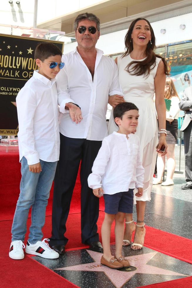 LOS ANGELES  AUG 22, Adam Silverman, Simon Cowell, Eric Cowell, Lauren Silverman at the Simon Cowell Star Ceremony on the Hollywood Walk of Fame on August 22, 2018 in Los Angeles, CA photo