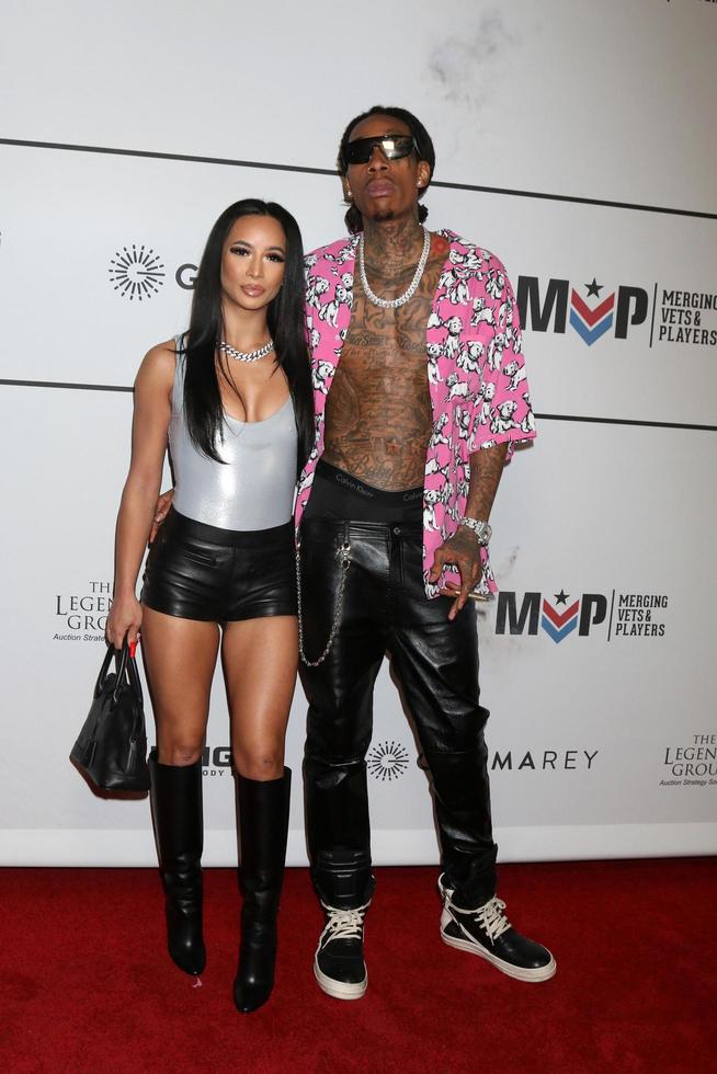 LOS ANGELES  FEB 9, Aimee Aguilar, Wiz Khalifa at the Merging Vets and Players Charity Super Bowl Kick Off Benefit at Academy LA Nightclub on February 9, 2022 in Los Angeles, CA photo