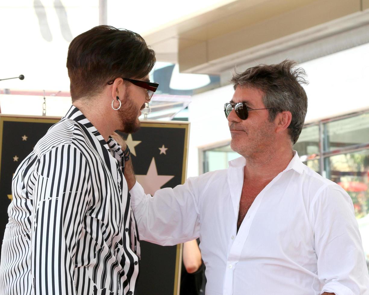 LOS ANGELES  AUG 22, Adam Lambert, Simon Cowell at the Simon Cowell Star Ceremony on the Hollywood Walk of Fame on August 22, 2018 in Los Angeles, CA photo