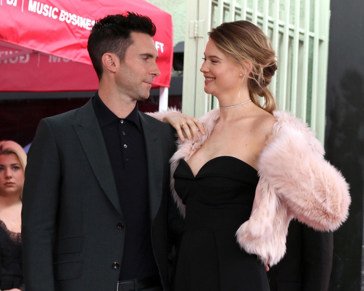 LOS ANGELES  FEB 10, Adam Levine, Behati Prinsloo at the Adam Levine Hollywood Walk of Fame Star Ceremony at Musicians Institute on February 10, 2017 in Los Angeles, CA photo