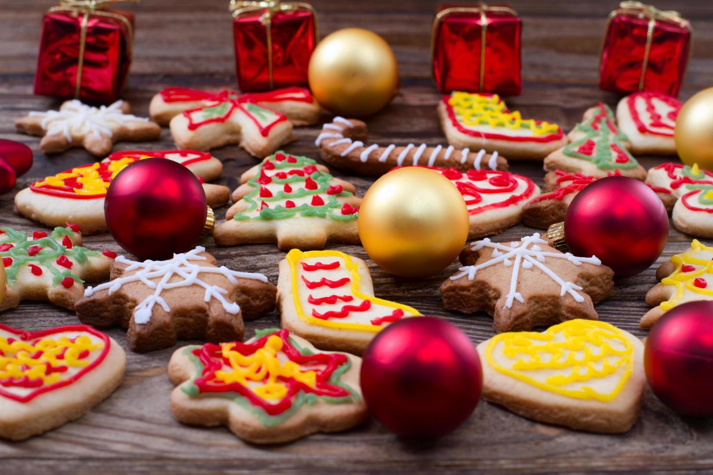 Christmas cookies on brown wooden table. Top view and mock up. photo