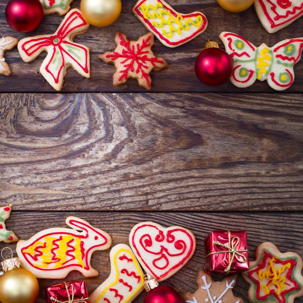 Christmas cookies on brown wooden table. Top view and mock up. photo