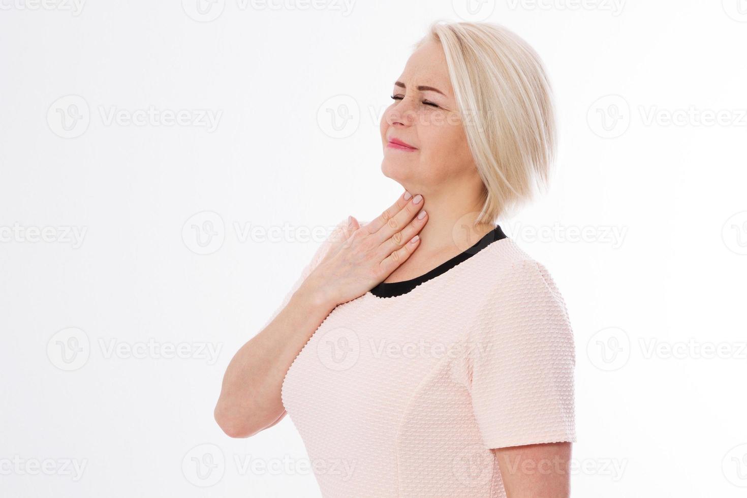 Sore throat woman pain, middle age woman suffer sore throat pain and touching her heck, female cold photo