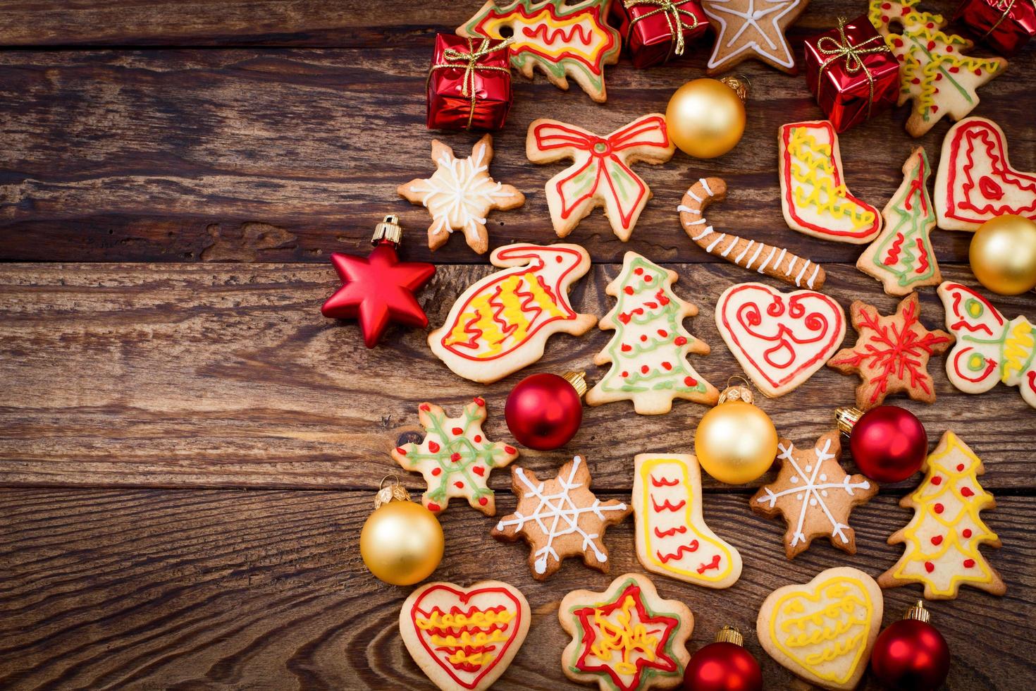 Christmas cookies on brown wooden table. Top view and mock up. photo