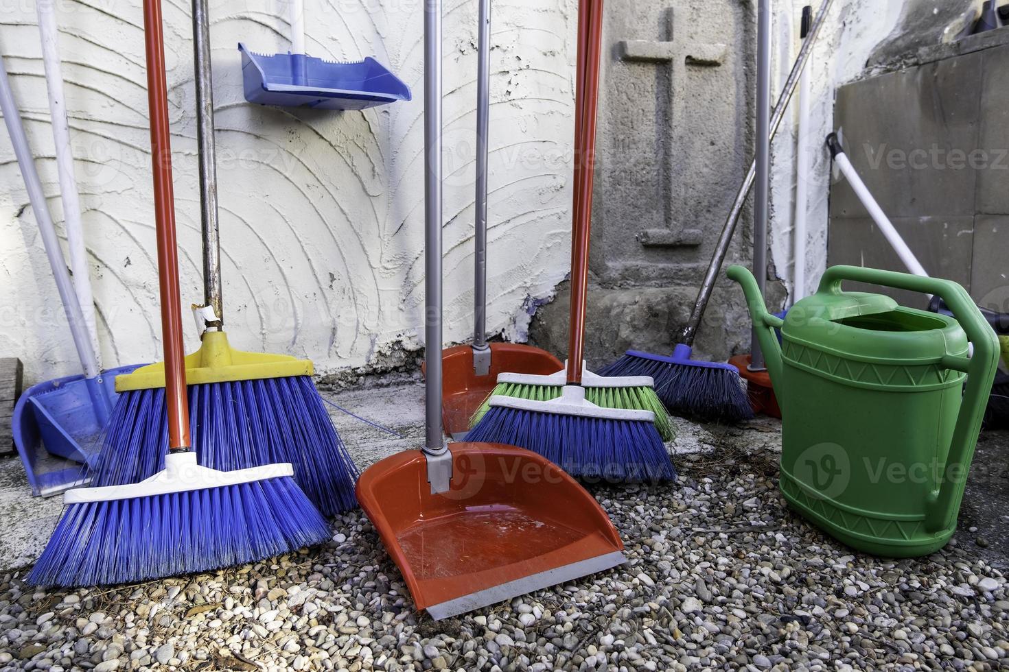 Brooms and dustpan photo