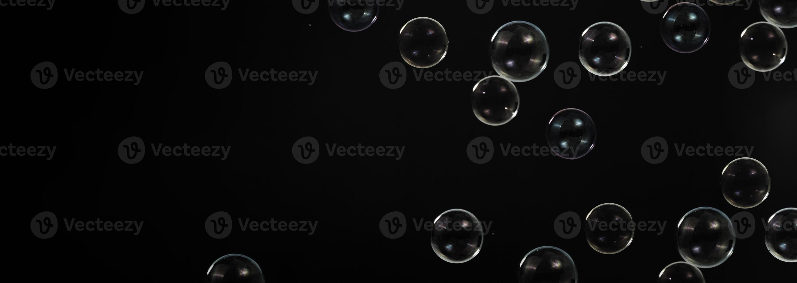 Soap bubble drop or Shampoo bubbles floating like flying in the air photo