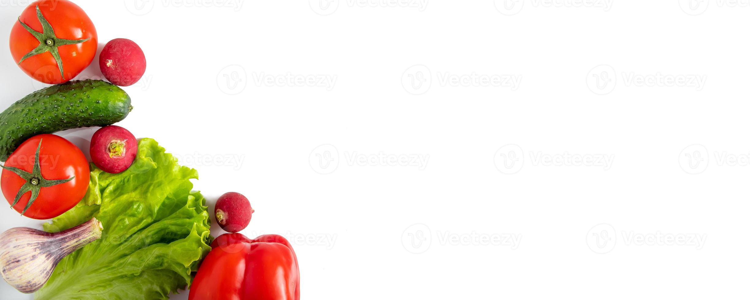 Fresh vegetables on a white background. Diet Food Concept. Place for text. photo