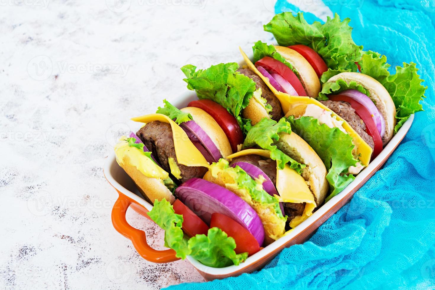 Delicious handmade burger on white background photo