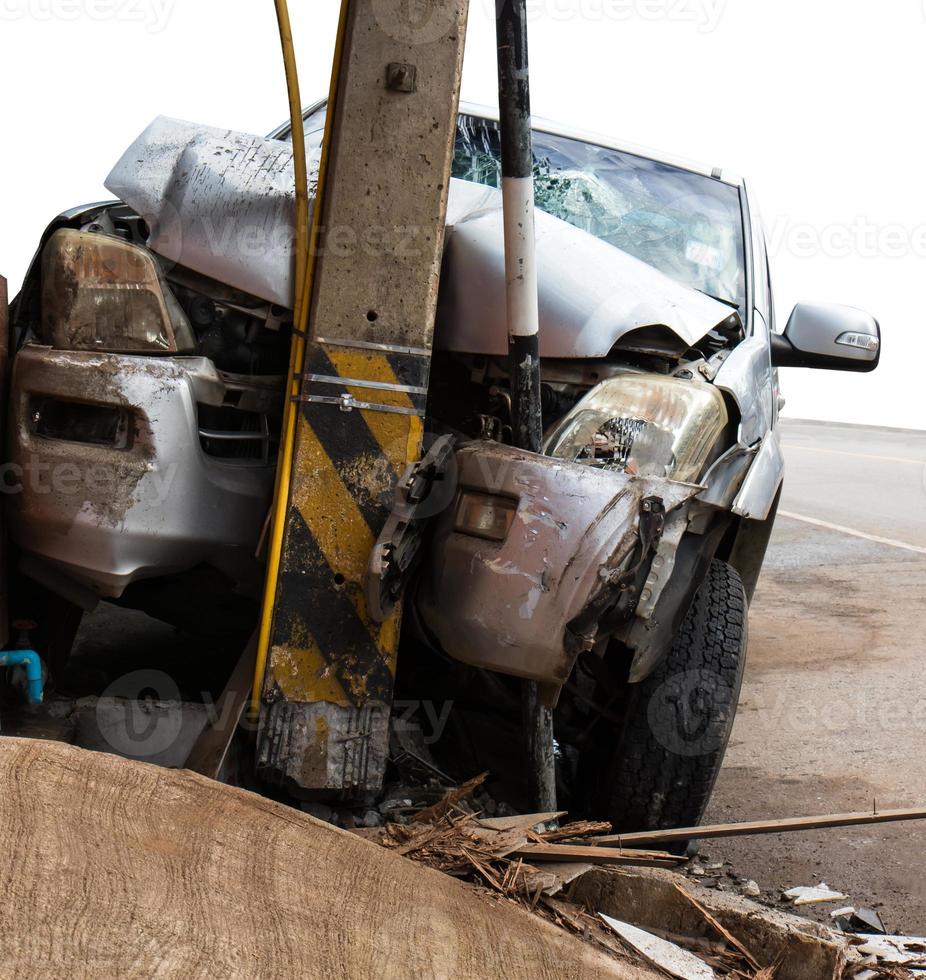 Car crashes into power pole. photo