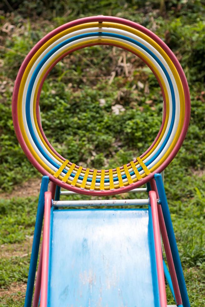 Colorful round iron in the playground. photo