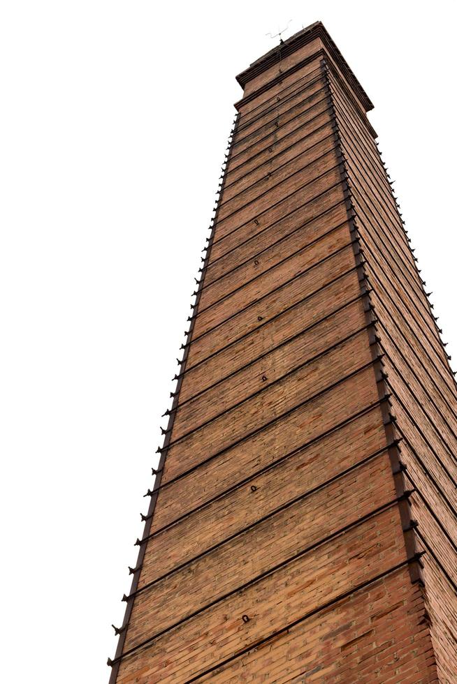 Isolate old brick chimney. photo