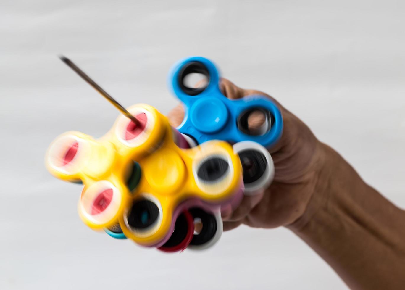 Many spinners are screwdriven. photo