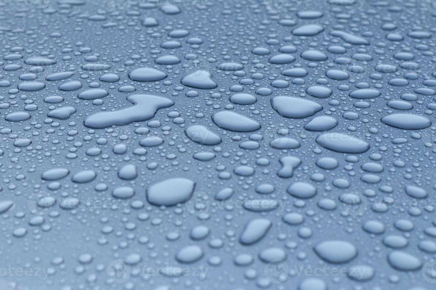 Dew drops on the roof of the car. photo