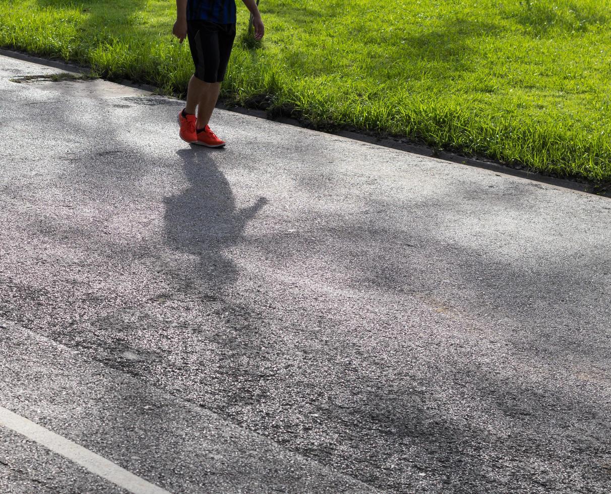 Shadow people running on the street. photo