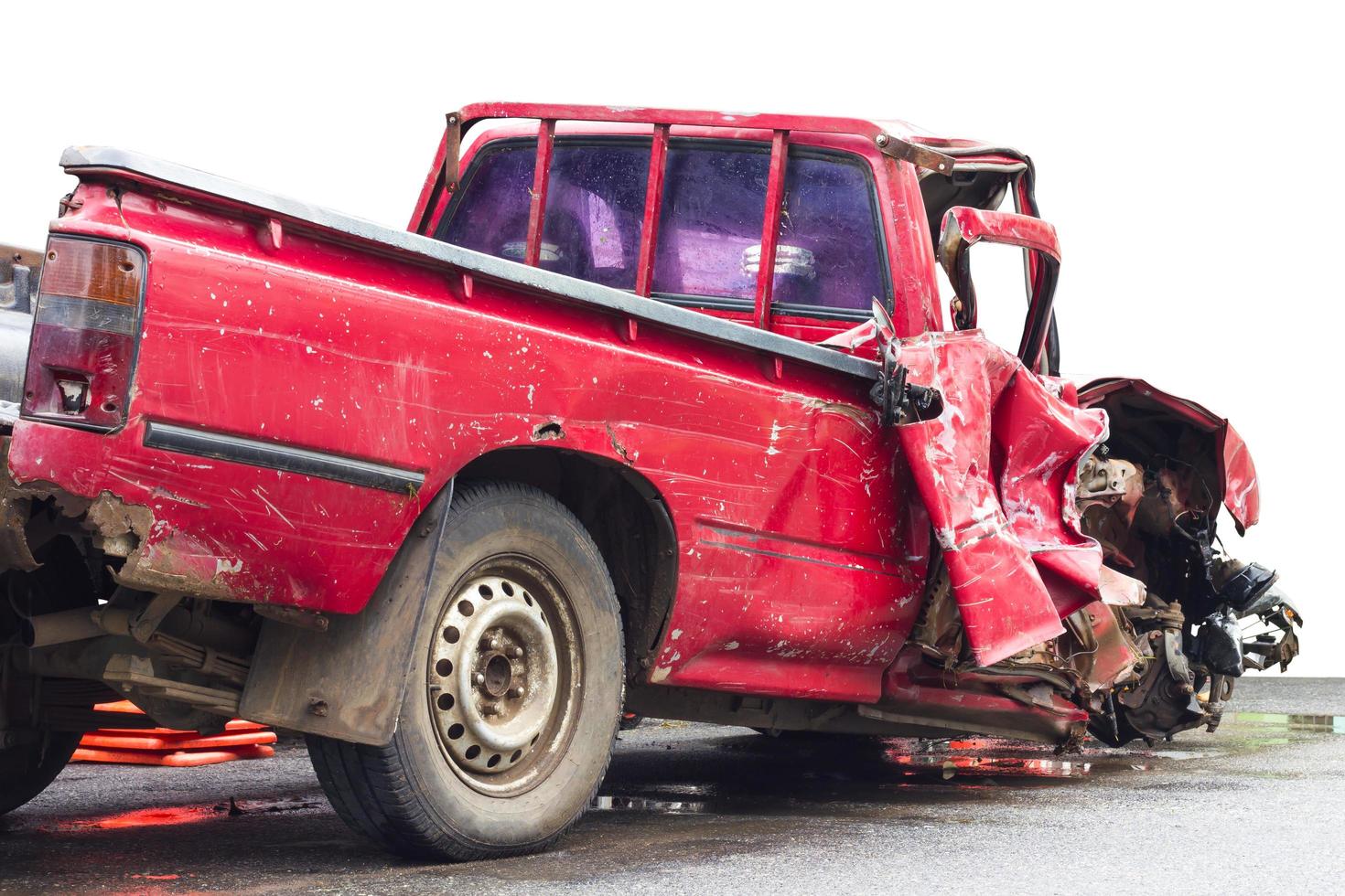 Old red car demolished from the back.. photo