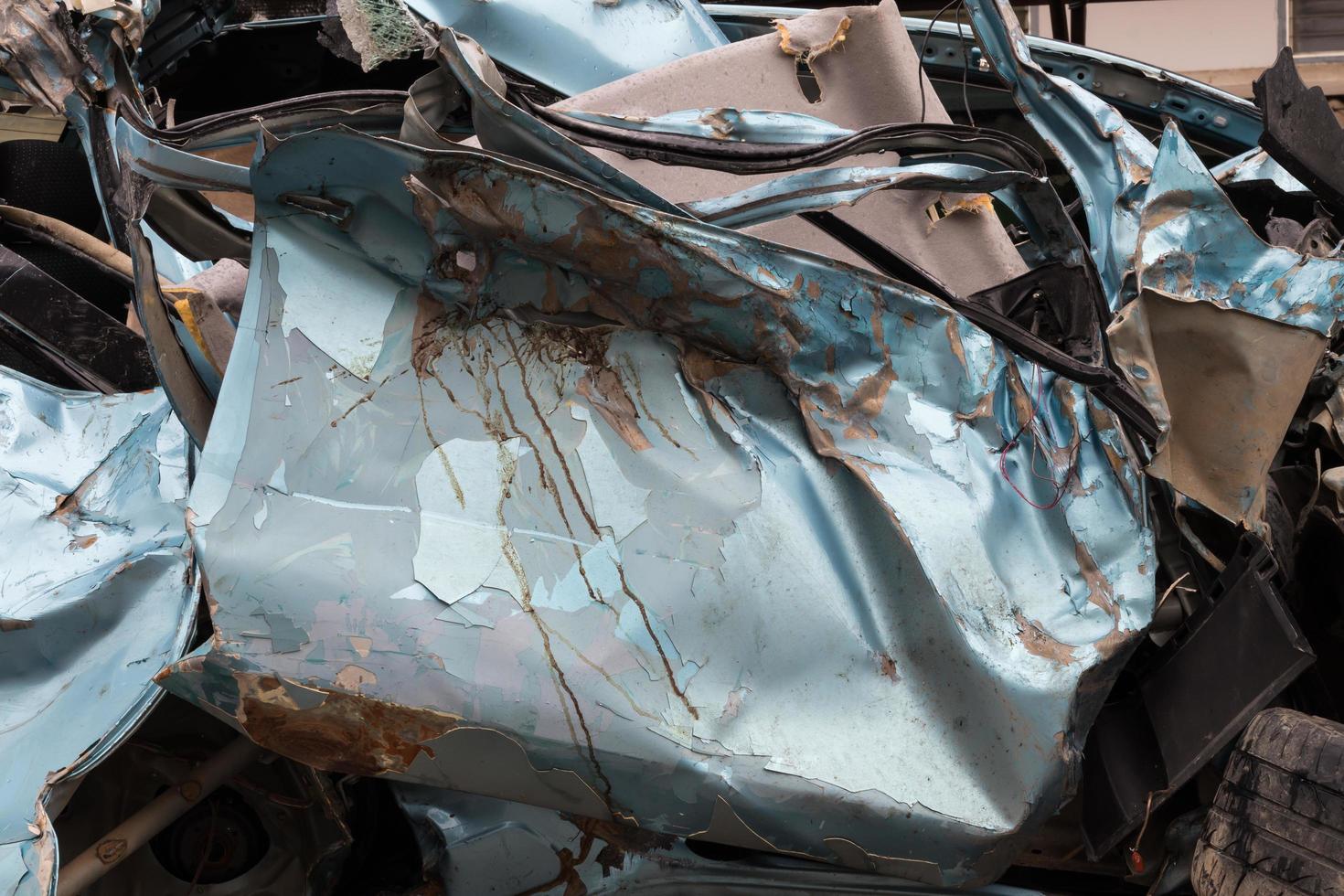 Close-up, light blue car was demolished. photo