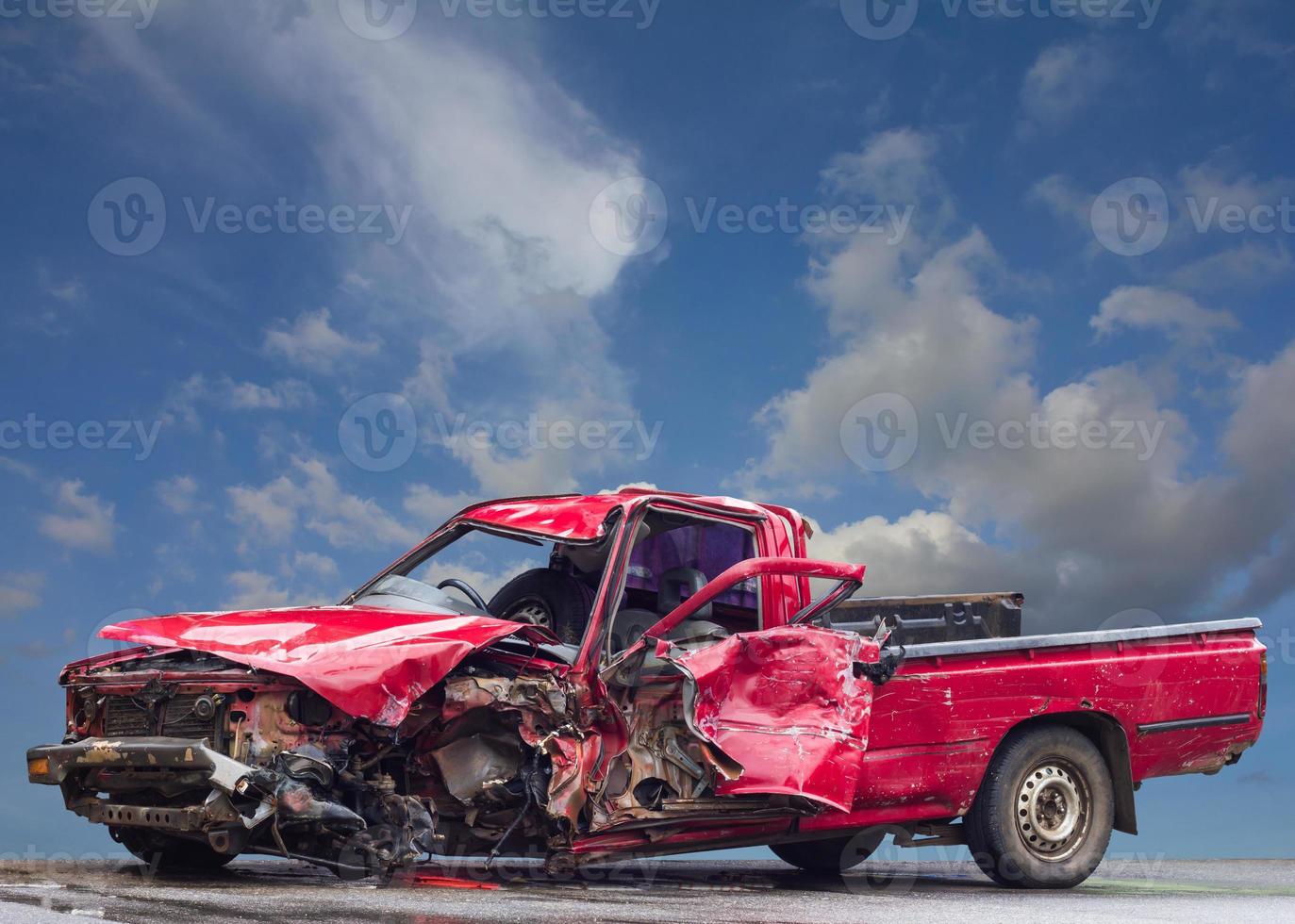 Red crumpled car wrecked. photo