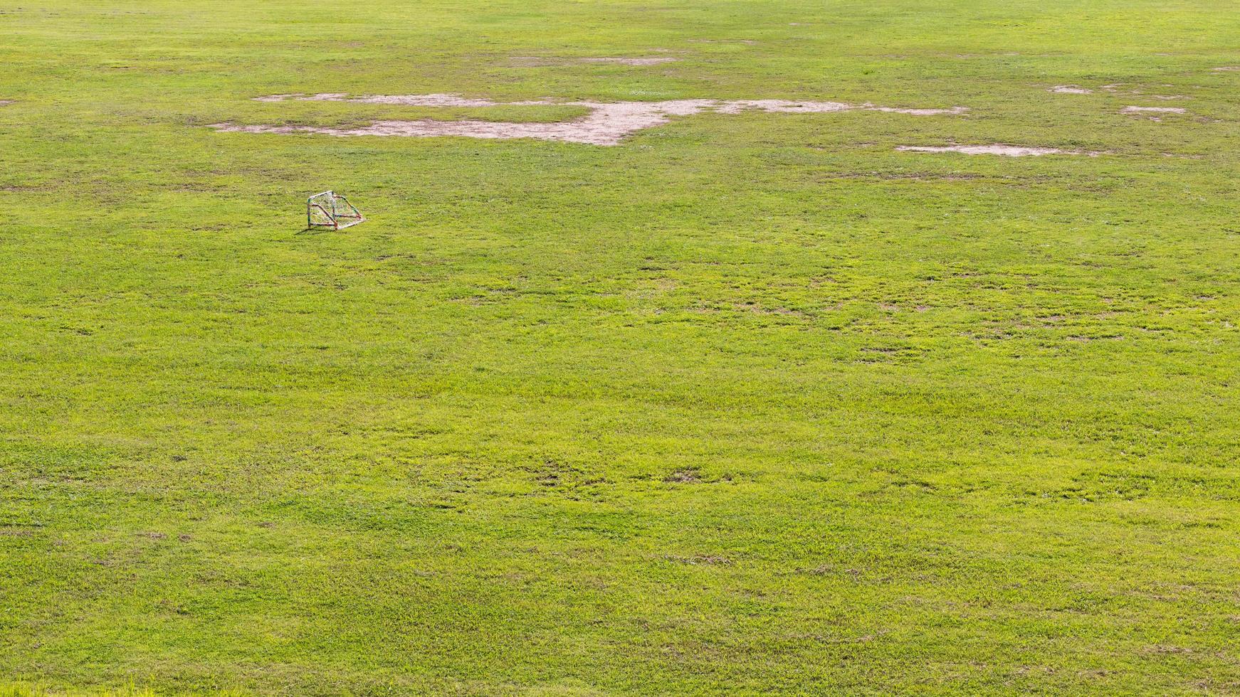 Lawn with small soccer goal. photo