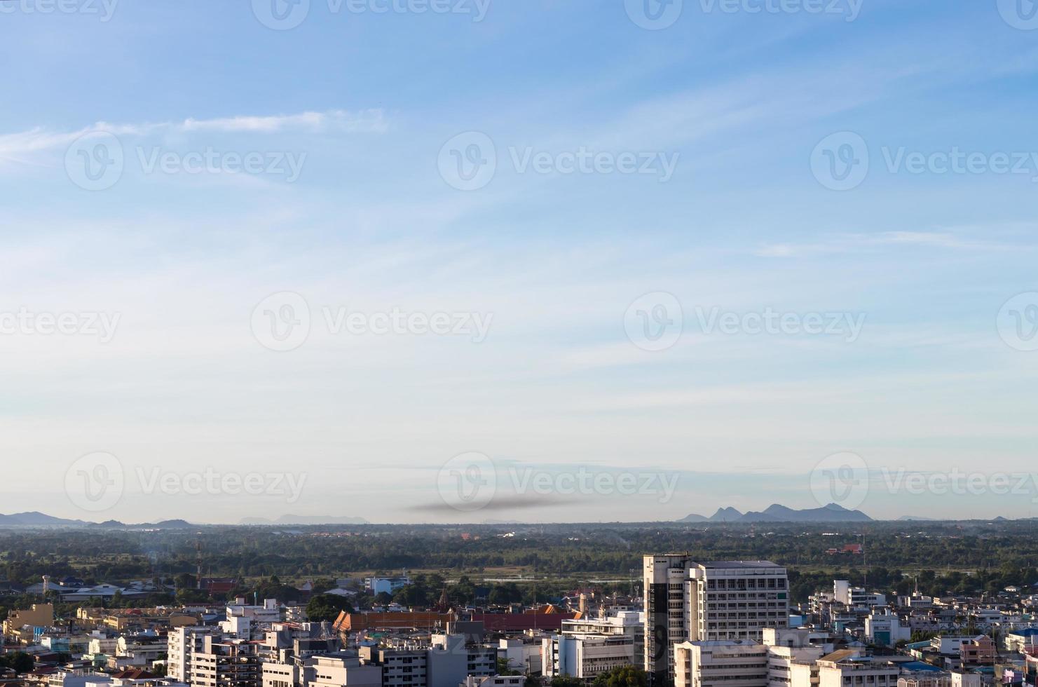 Buildings, forests, mountains, sky. photo