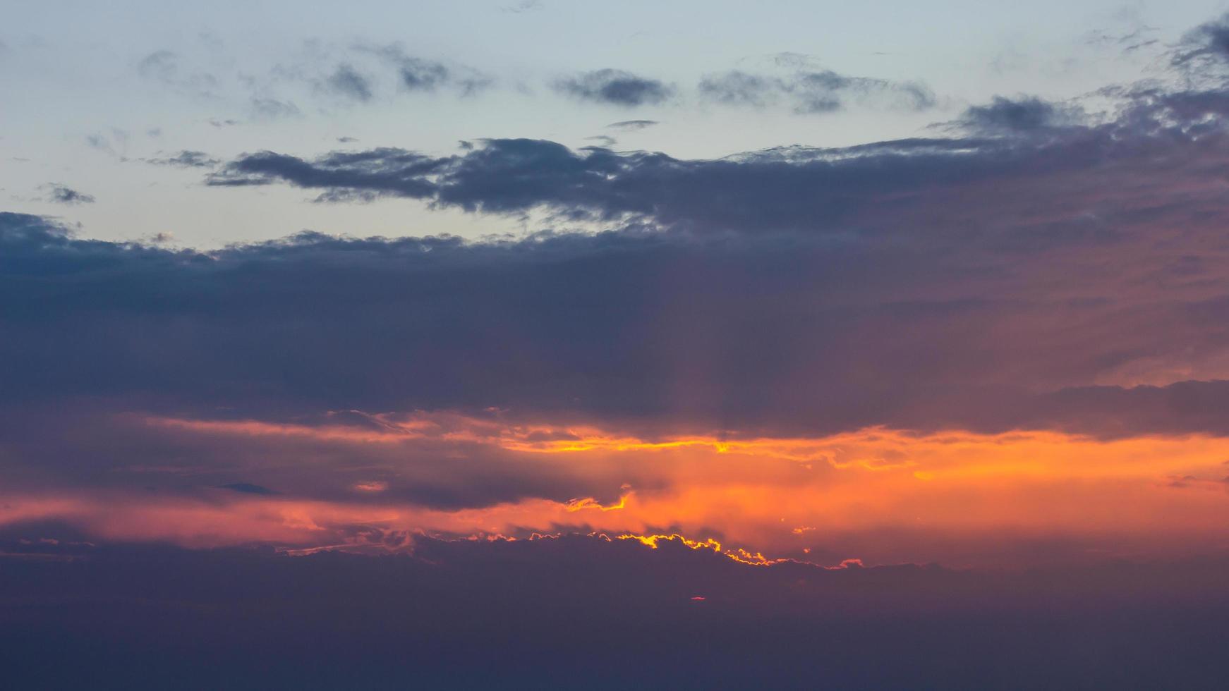 Orange broke through cloudy. photo