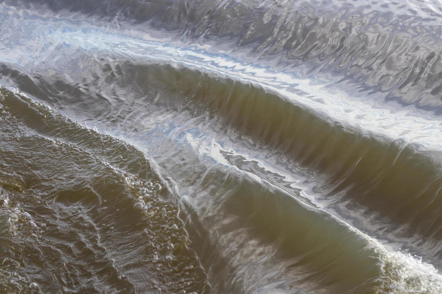 Wave surface is watery. photo