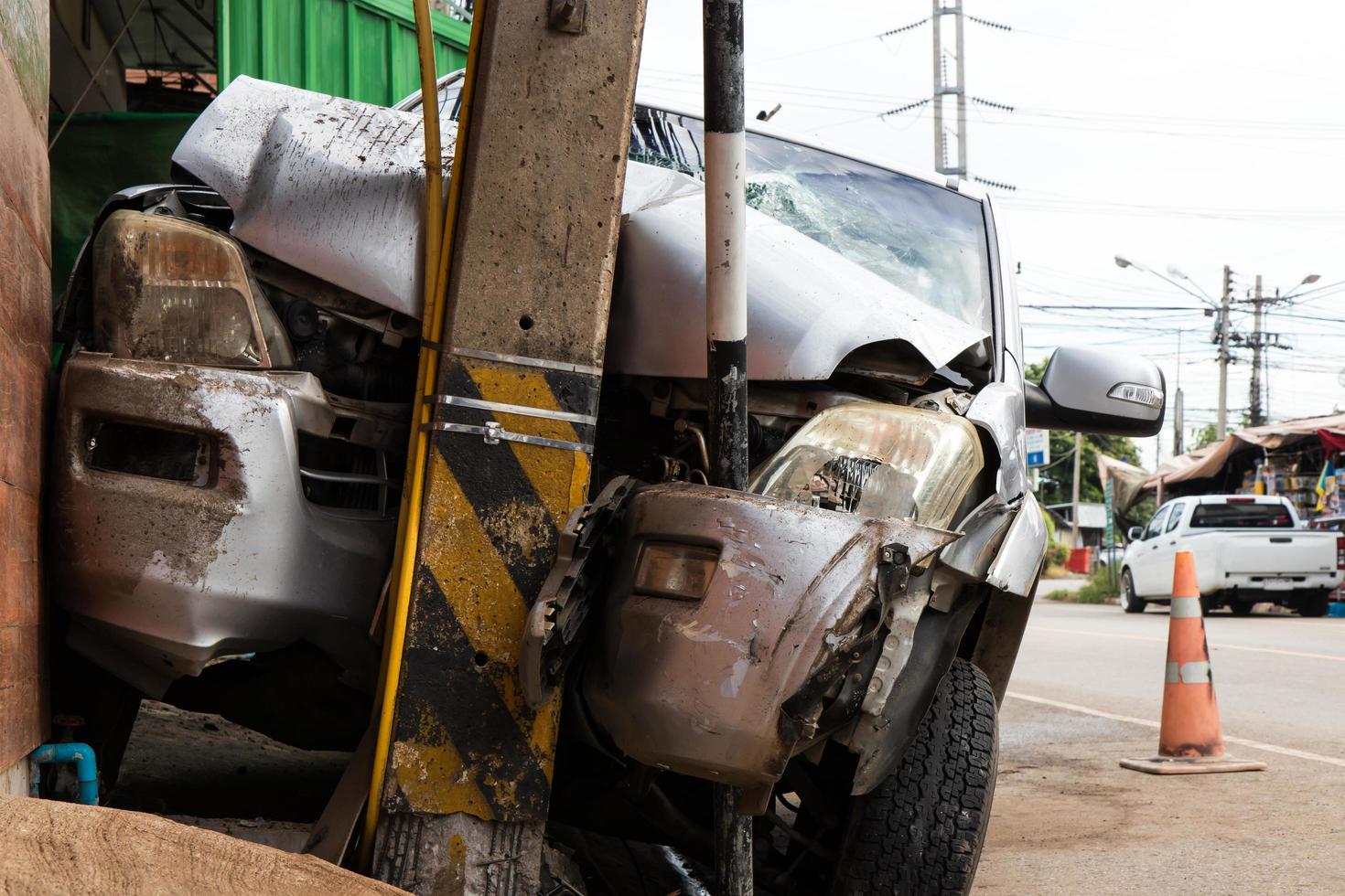 Car crashed into power pole. photo