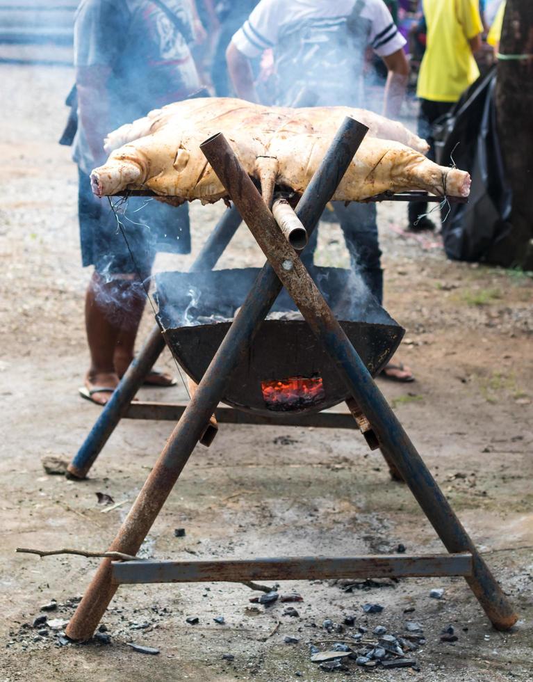 Grilled pork on a rustic stove. photo