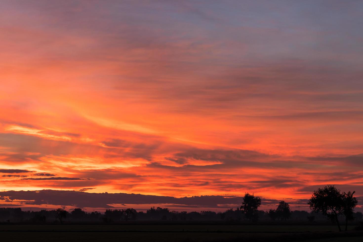 Sky orange and yellow countryside. photo