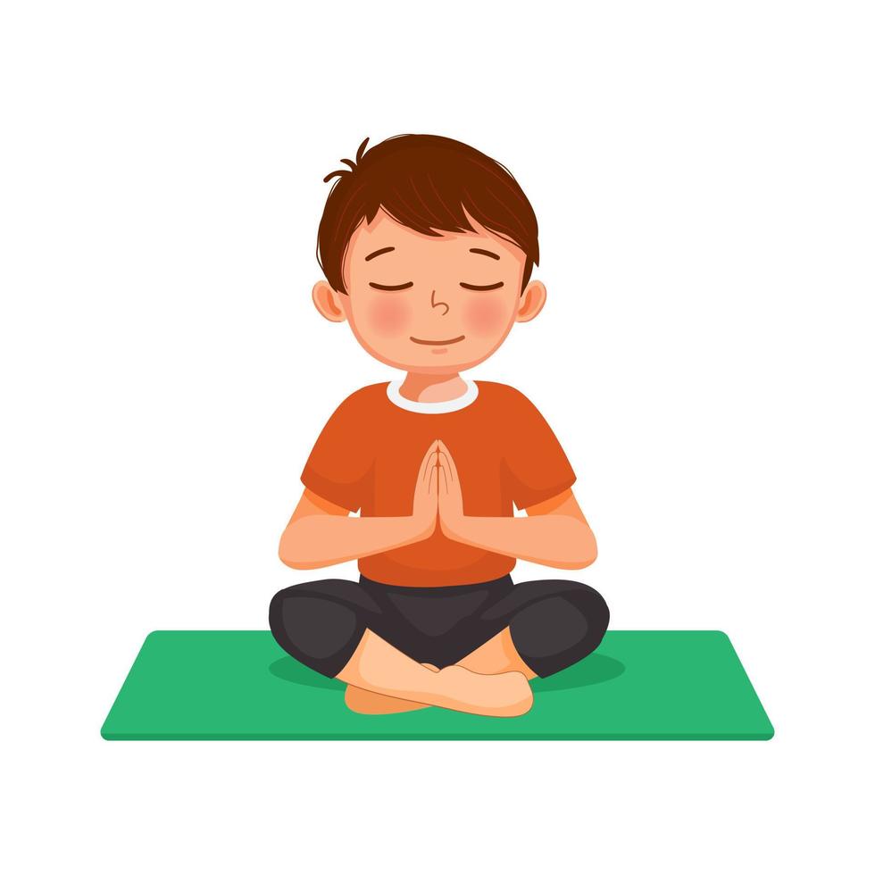 Cute little boy doing gymnastic fitness exercises practicing yoga meditation sitting in lotus pose on a green mat indoor at home vector