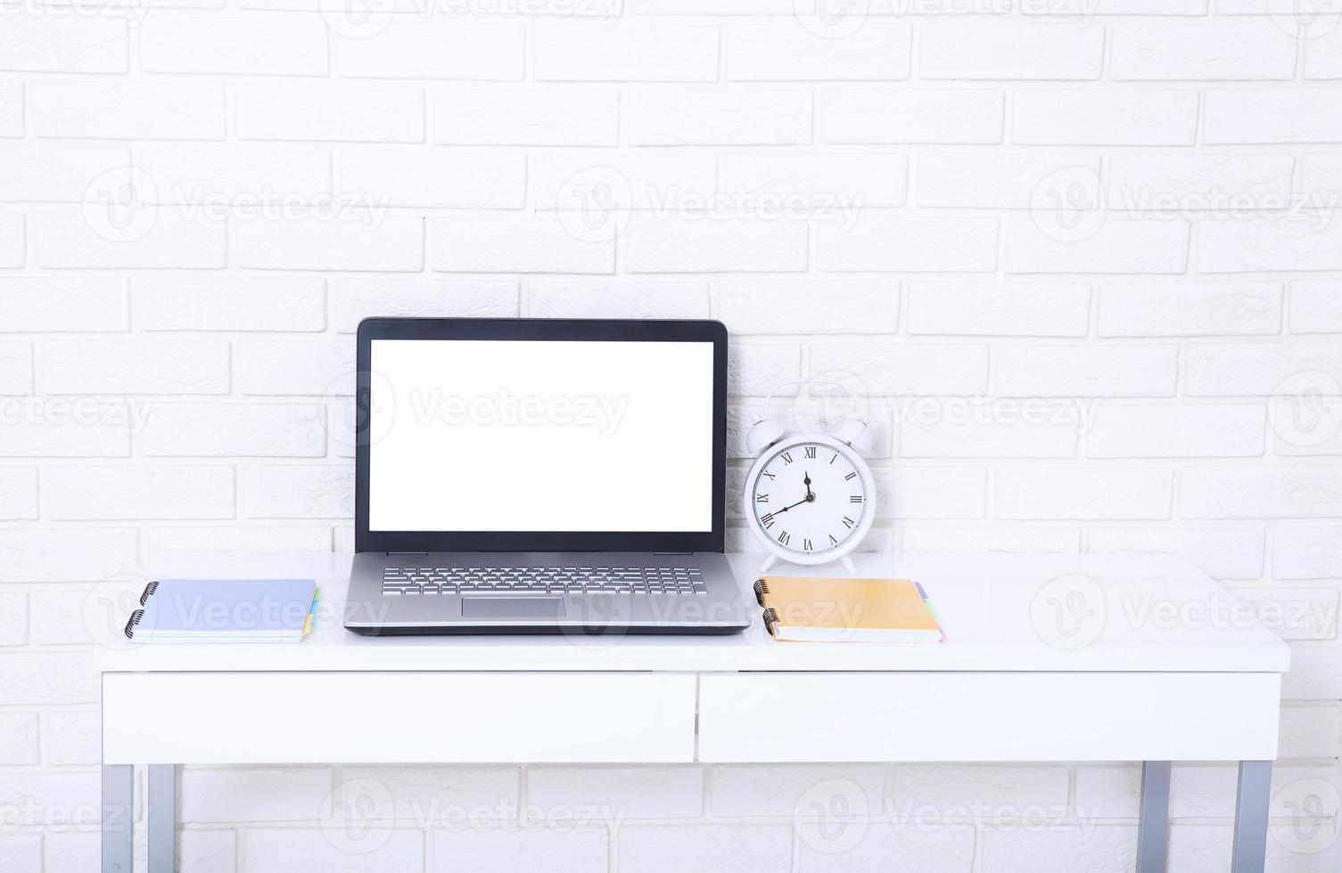 Workspace with laptop and other work accessories with copy space. Selective focus. Education photo