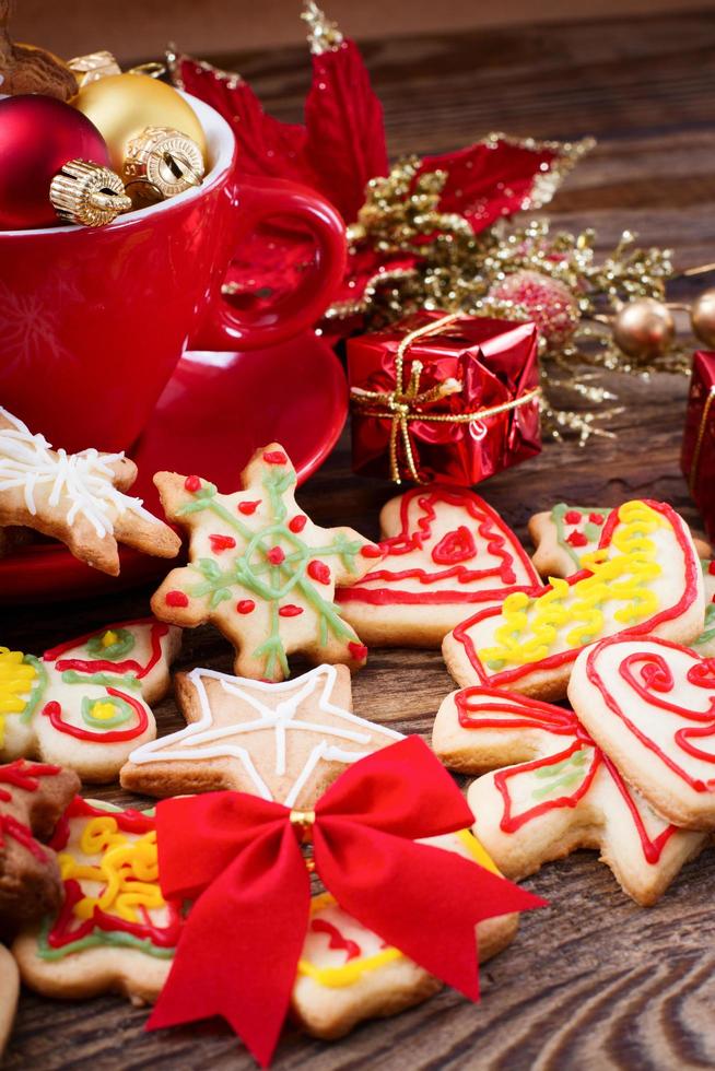 Knar and christmas food sweet cookies on wooden table background. Copy space. Selective focus. Happy new year concept. photo